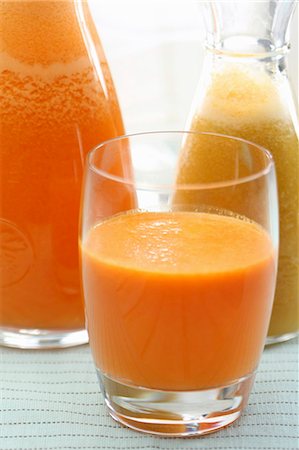 pressed juice - Freshly squeezed carrot and orange juice Stock Photo - Premium Royalty-Free, Code: 659-06183956