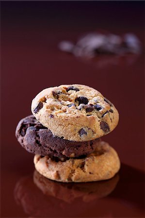 stack of chocolates - Chocolate chip cookies, stacked Stock Photo - Premium Royalty-Free, Code: 659-06306176