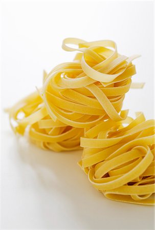 pasta italy - Tagliatelle nests Stock Photo - Premium Royalty-Free, Code: 659-06306314