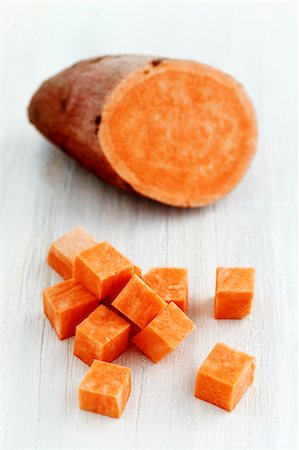 Sweet potatoes, sliced and diced Stock Photo - Premium Royalty-Free, Code: 659-06306331