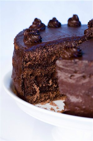 simsearch:659-06306417,k - Chocolate cake (detail) Foto de stock - Sin royalties Premium, Código: 659-06306418