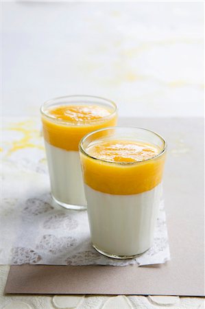 desserts with fruit sauces - Panna cotta with apricot puree Stock Photo - Premium Royalty-Free, Code: 659-06306464