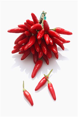 red pepper isolated - A bunch of fresh red chilli peppers Stock Photo - Premium Royalty-Free, Code: 659-06306517