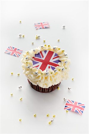 A cupcake topped with cream and a Union Jack Stock Photo - Premium Royalty-Free, Code: 659-06306626