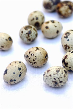 Several quails' eggs Fotografie stock - Premium Royalty-Free, Codice: 659-06306758