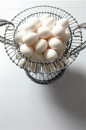 simsearch:659-01850865,k - Organic White Eggs in a Wire Basket; From Above Stock Photo - Premium Royalty-Free, Code: 659-06306751