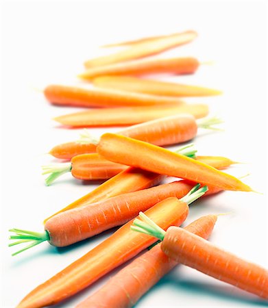 Carrots, whole and halved Stock Photo - Premium Royalty-Free, Code: 659-06306795