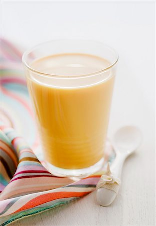 Mango lassi (a mango and yogurt drink) Stock Photo - Premium Royalty-Free, Code: 659-06306822