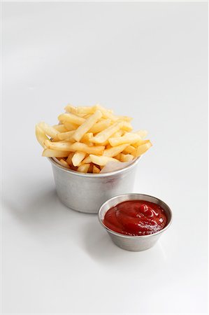 fried potato - Frites et ketchup Photographie de stock - Premium Libres de Droits, Code: 659-06306936