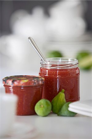 Two jars of strawberry jam and fresh figs Stock Photo - Premium Royalty-Free, Code: 659-06307017