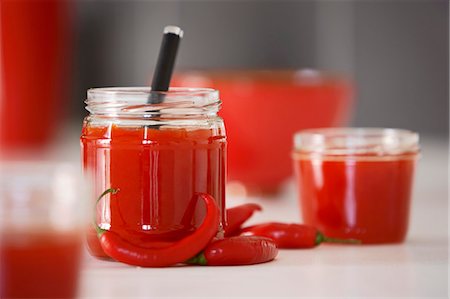 Pepper and chilli chutney in jars Fotografie stock - Premium Royalty-Free, Codice: 659-06307018
