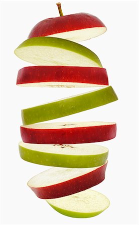 simsearch:659-06187916,k - Flying slices of red and green apple Foto de stock - Sin royalties Premium, Código: 659-06307071