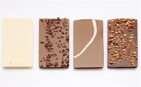 Four different bars of chocolate Foto de stock - Sin royalties Premium, Código: 659-06307086