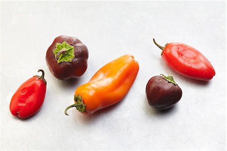 Assorted Fresh Peppers on White Stock Photo - Premium Royalty-Free, Code: 659-06307216