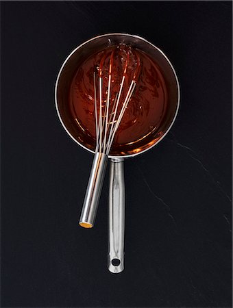 simsearch:659-03532192,k - Liquid chocolate in a saucepan with a whisk (seen from above) Stock Photo - Premium Royalty-Free, Code: 659-06307520