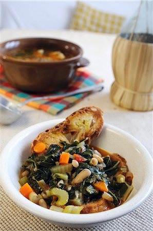Black cabbage, bean and crostini stew (Tuscany, Italy) Stock Photo - Premium Royalty-Free, Code: 659-06307562