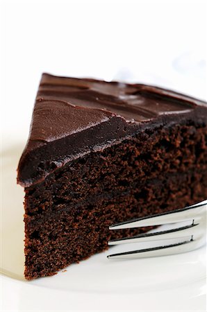 sponge cake - A piece of chocolate cake Stock Photo - Premium Royalty-Free, Code: 659-06307703