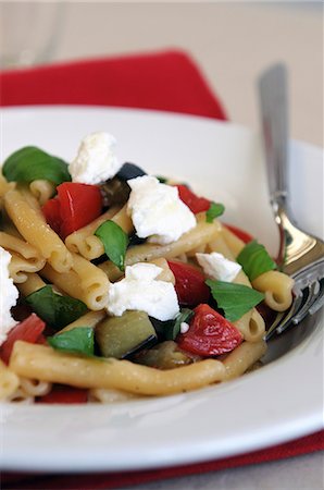 Pasta with aubergines, tomatoes and ricotta Stock Photo - Premium Royalty-Free, Code: 659-06307839