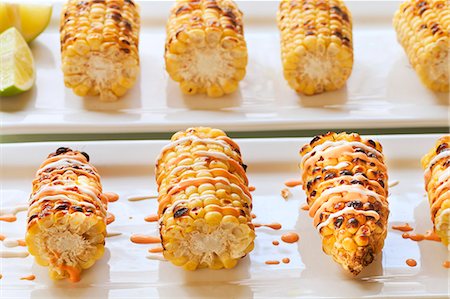 simsearch:659-08513113,k - Roasted Corn on the Cob with Mexican Style Sauce Stock Photo - Premium Royalty-Free, Code: 659-06372324