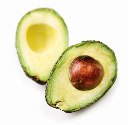 A halved avocado Stock Photo - Premium Royalty-Free, Code: 659-06372372