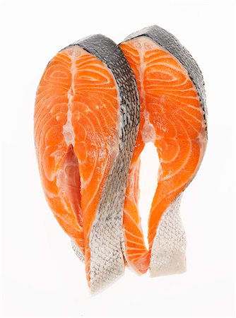 simsearch:659-06372672,k - Two Salmon Steaks on a White Background Stock Photo - Premium Royalty-Free, Code: 659-06372578