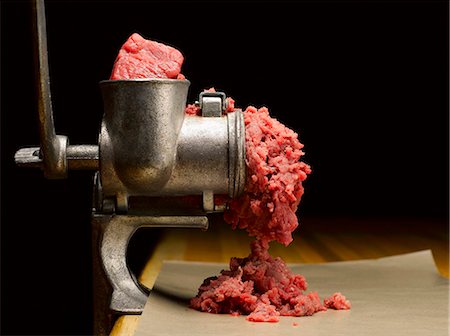 Beef in a Meat Grinder Stock Photo - Premium Royalty-Free, Code: 659-06372589