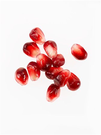 simsearch:659-06495618,k - Fresh Pomegranate Seeds on a White Background Stock Photo - Premium Royalty-Free, Code: 659-06372582