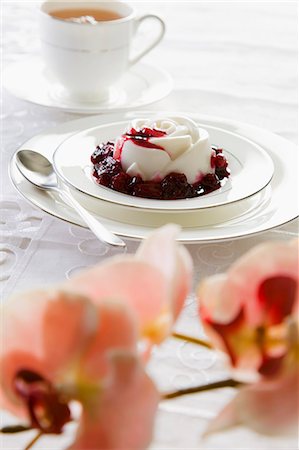 simsearch:659-06188340,k - Coconut panna cotta with fruit sauce Stock Photo - Premium Royalty-Free, Code: 659-06372648