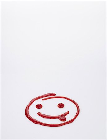 plain (simple) - A funny ketchup smiley Stock Photo - Premium Royalty-Free, Code: 659-06372655