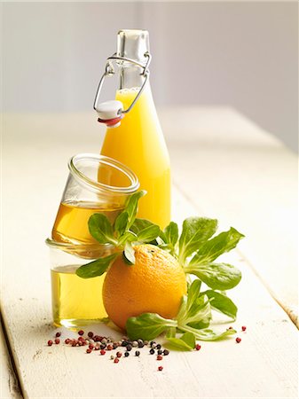 spiced oil - Ingredients for salad with orange wedges Stock Photo - Premium Royalty-Free, Code: 659-06372736