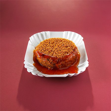 A breaded bami slice with sauce Foto de stock - Sin royalties Premium, Código: 659-06372852