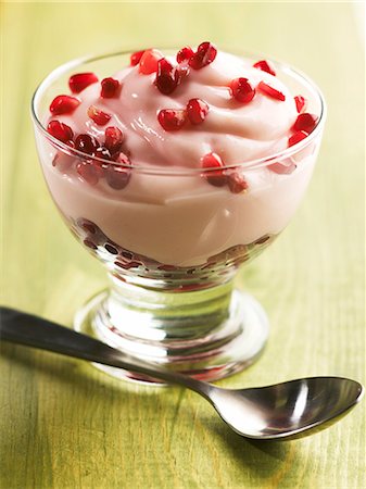 Glass Dish of Cherry Cheesecake Yogurt with Pomegranate Seeds Stock Photo - Premium Royalty-Free, Code: 659-06372909