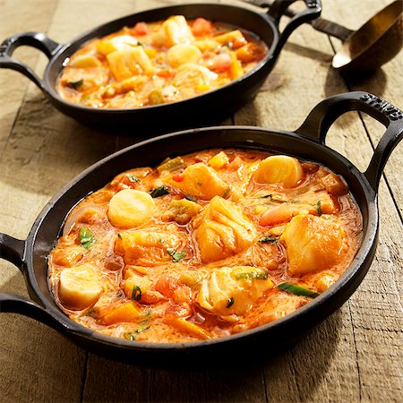 estofado - Brazilian Fish Stew with Sea Bass and Hearts of Palm Foto de stock - Sin royalties Premium, Código: 659-06372915