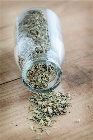 southern french - Herbs de Provence falling out of a jar Stock Photo - Premium Royalty-Free, Code: 659-06372979