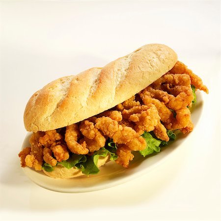 Fried Clam Strip Sandwich Sandwich with Lettuce Stock Photo - Premium Royalty-Free, Code: 659-06373058