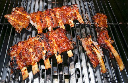 Marinated veal spare ribs on the grill Stock Photo - Premium Royalty-Free, Code: 659-06373086