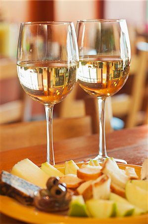 simsearch:659-06495122,k - Two Glasses of White Wine with Fruit and Cheese Stock Photo - Premium Royalty-Free, Code: 659-06373104