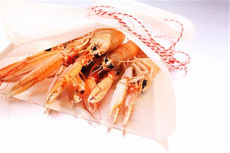Scampi on paper Stock Photo - Premium Royalty-Free, Code: 659-06373228