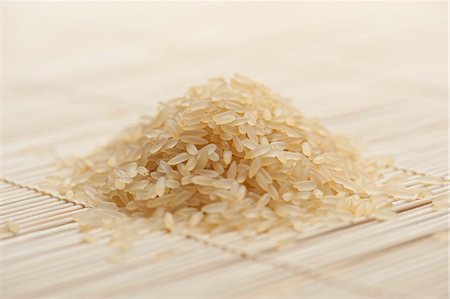 A heap of long-grain rice Foto de stock - Sin royalties Premium, Código: 659-06373314