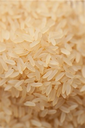sin hacer - Long grain rice (full frame) Foto de stock - Sin royalties Premium, Código: 659-06373313