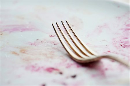 fork close up food - A fork on a dirty plate Stock Photo - Premium Royalty-Free, Code: 659-06373322