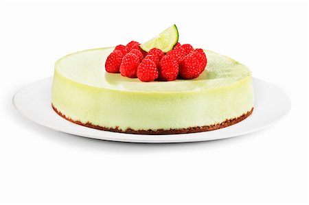 plate cut out - Key Lime Cheesecake Topped with Raspberries Stock Photo - Premium Royalty-Free, Code: 659-06373350