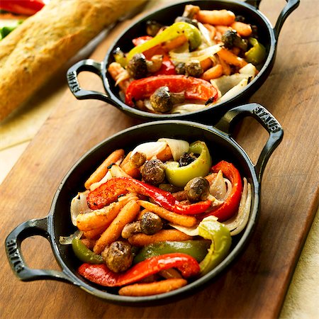 fry pan - Mixed Roasted Vegetables in Cast Iron Skillets Stock Photo - Premium Royalty-Free, Code: 659-06373402