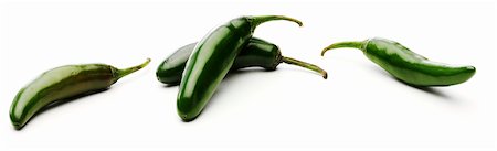 Fresh Whole Jalapeno Peppers on a White Background Stock Photo - Premium Royalty-Free, Code: 659-06373498