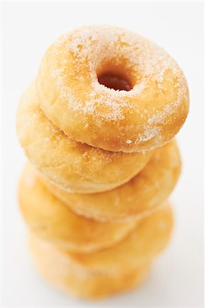 sugary - A stack of doughnuts Stock Photo - Premium Royalty-Free, Code: 659-06373542