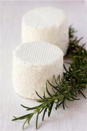 rosemary sprig - Crottin de Cavignole (French goat's cheese) Stock Photo - Premium Royalty-Free, Code: 659-06373741