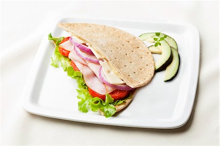 plate cut out - Turkey and Swiss Cheese Sandwich on Flatbread Stock Photo - Premium Royalty-Free, Code: 659-06373816