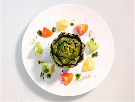 pistou - An artichoke with tomatoes and pesto Stock Photo - Premium Royalty-Free, Code: 659-06373891