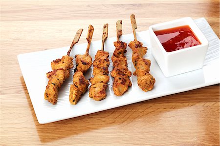 skewered - Chicken kebabs with barbecue sauce Stock Photo - Premium Royalty-Free, Code: 659-06494011