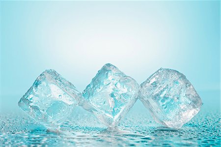 Three ice cubes Stock Photo - Premium Royalty-Free, Code: 659-06494047